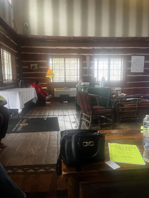 A view across the meeting room, with chairs and tables prepared.