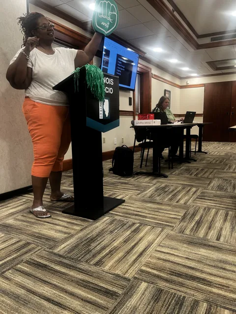 Another view of the speaker at the lectern.