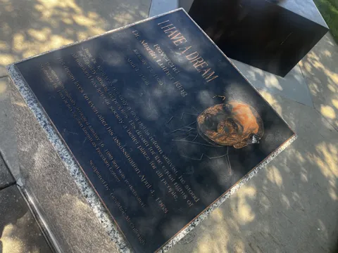 A commemorative plaque headed “I Have a Dream,” with a portrait relief.